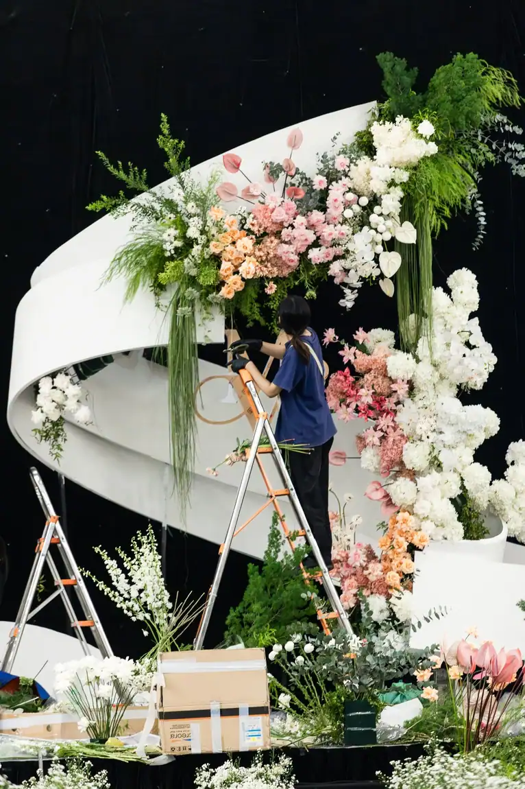 Styling the floral installation on site